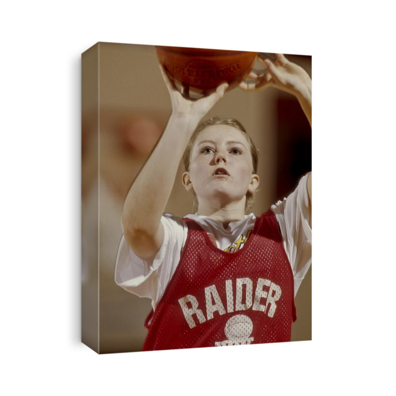 Girls High School basketball player during training session.