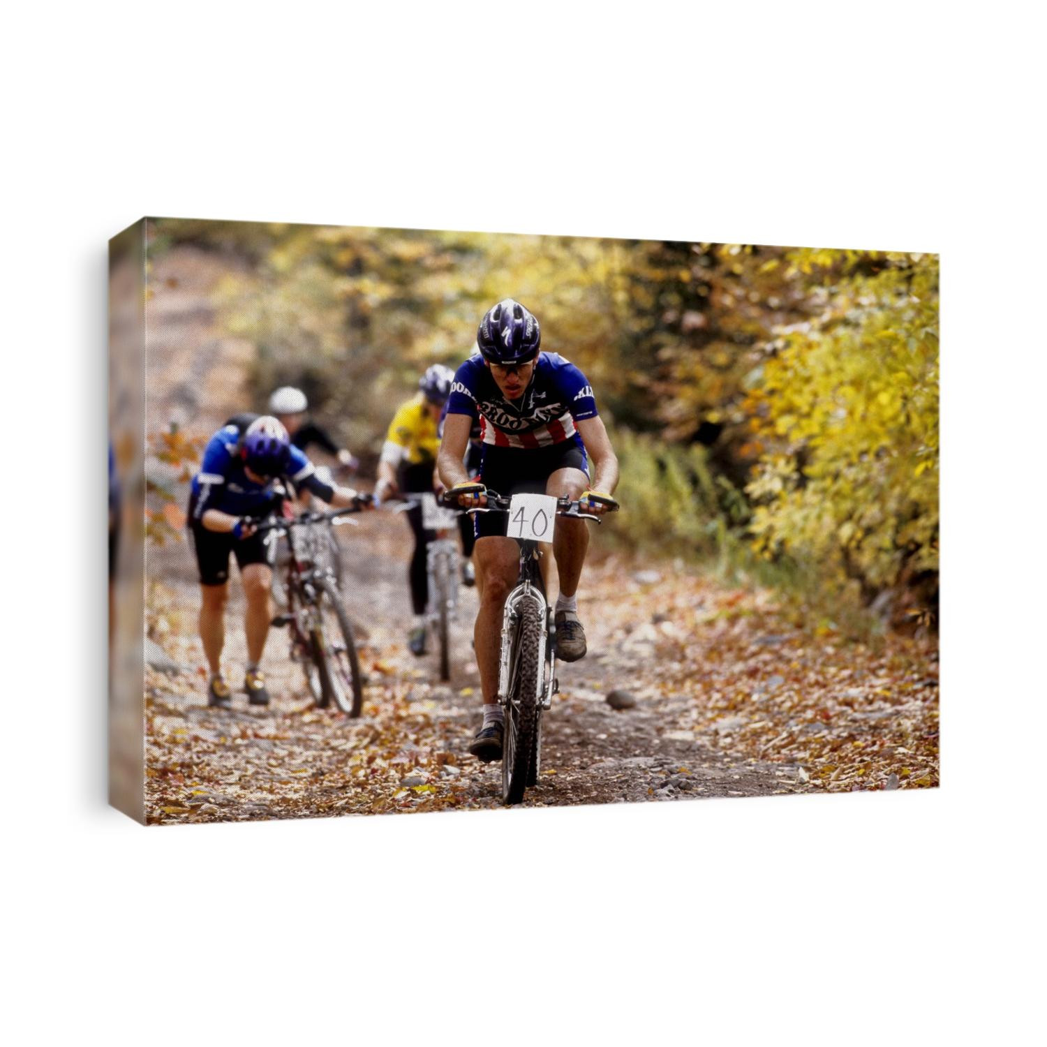 Male mountain biker competing in a race. 1993 NY State Champpnships.