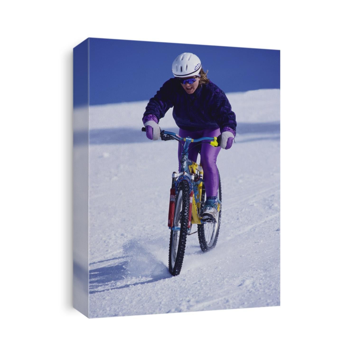 Mountain biking on snow.