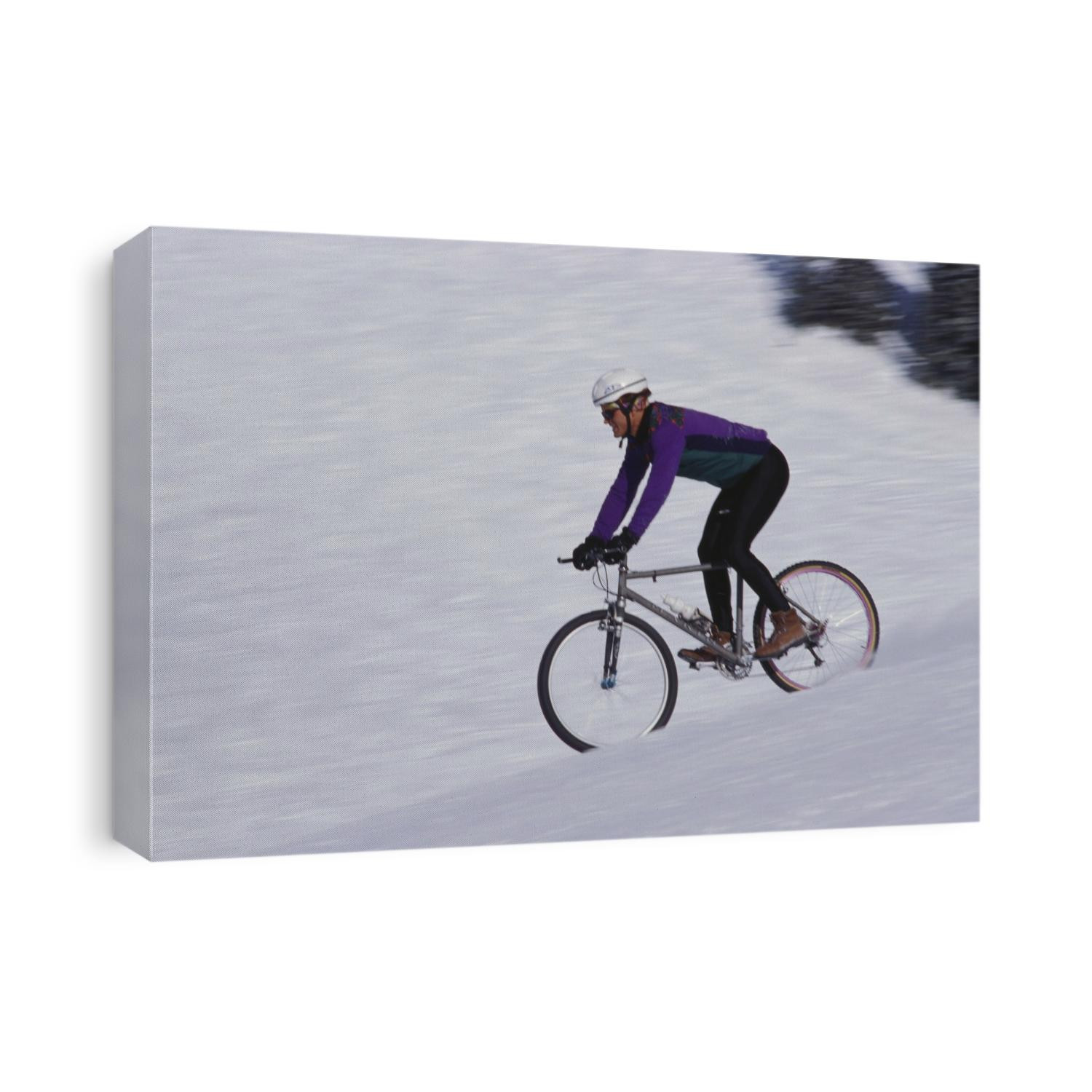 Mountain biking on snow.