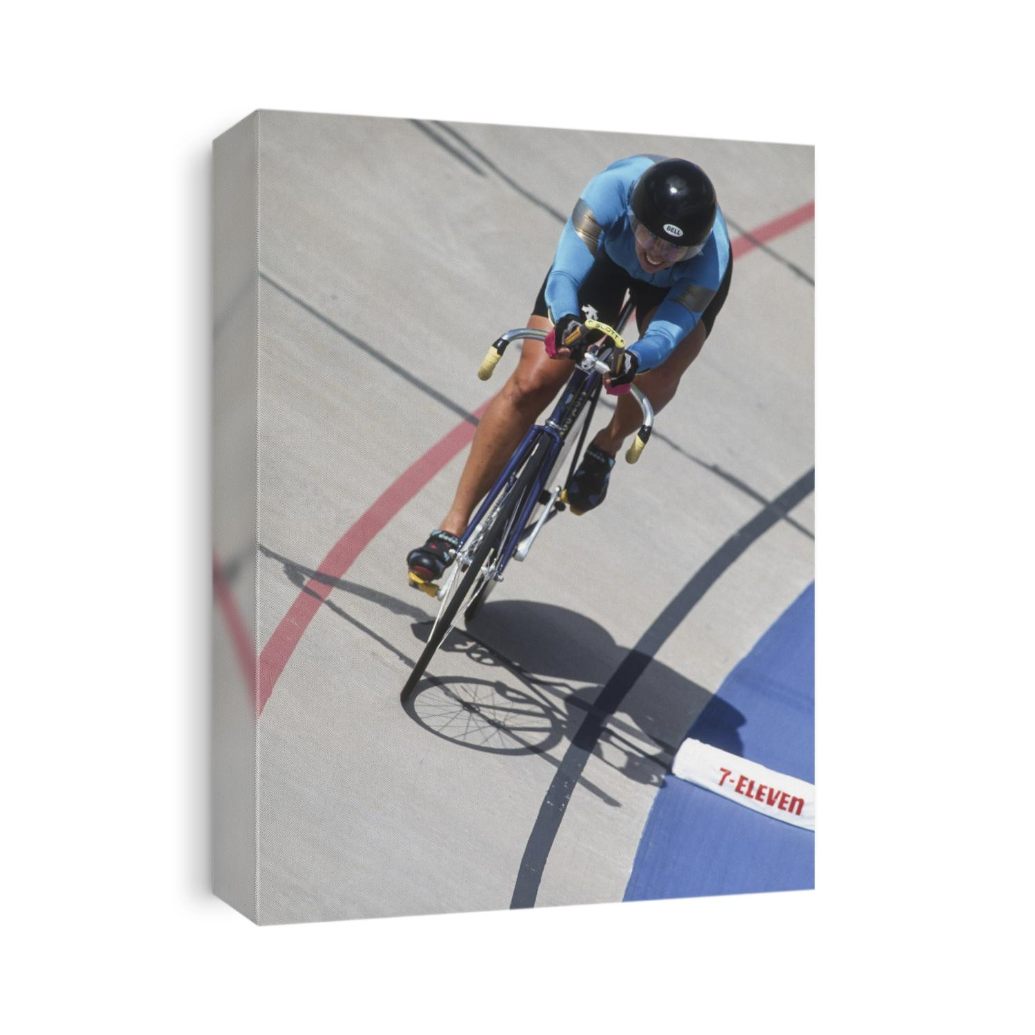 Woman cyclist competing on the veledrome.