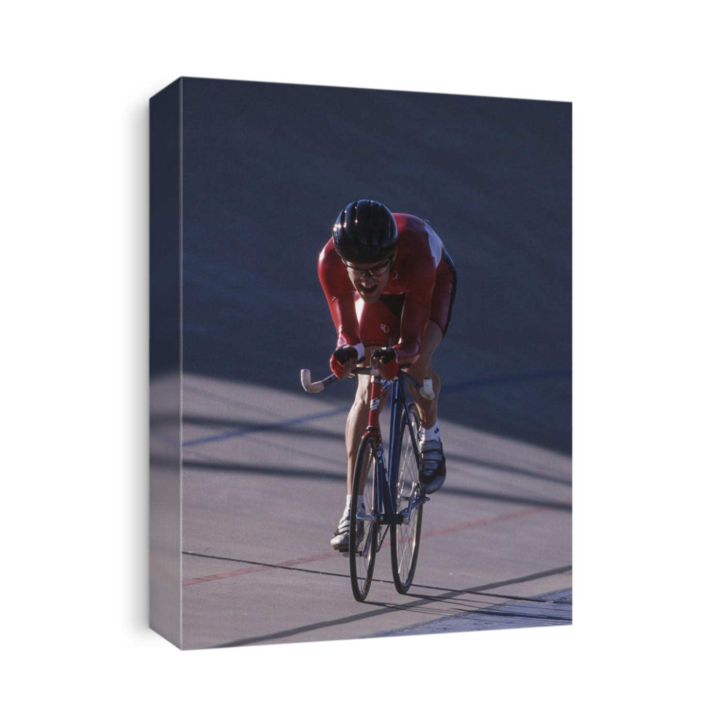 Male cyclist competing on the veledrome.