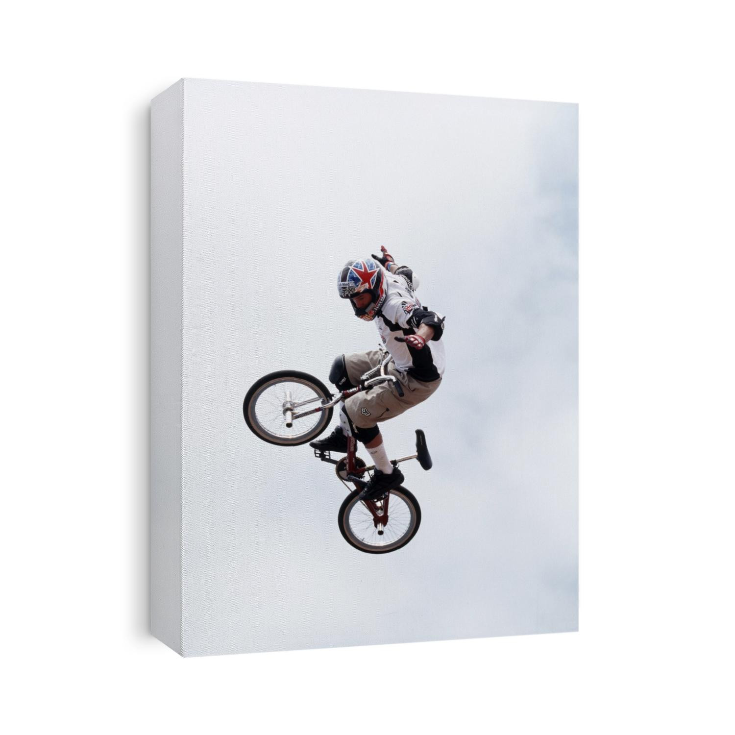 Dave Mirra flying over the vert on his BMX bike at the 1999 B3 X-games competition.