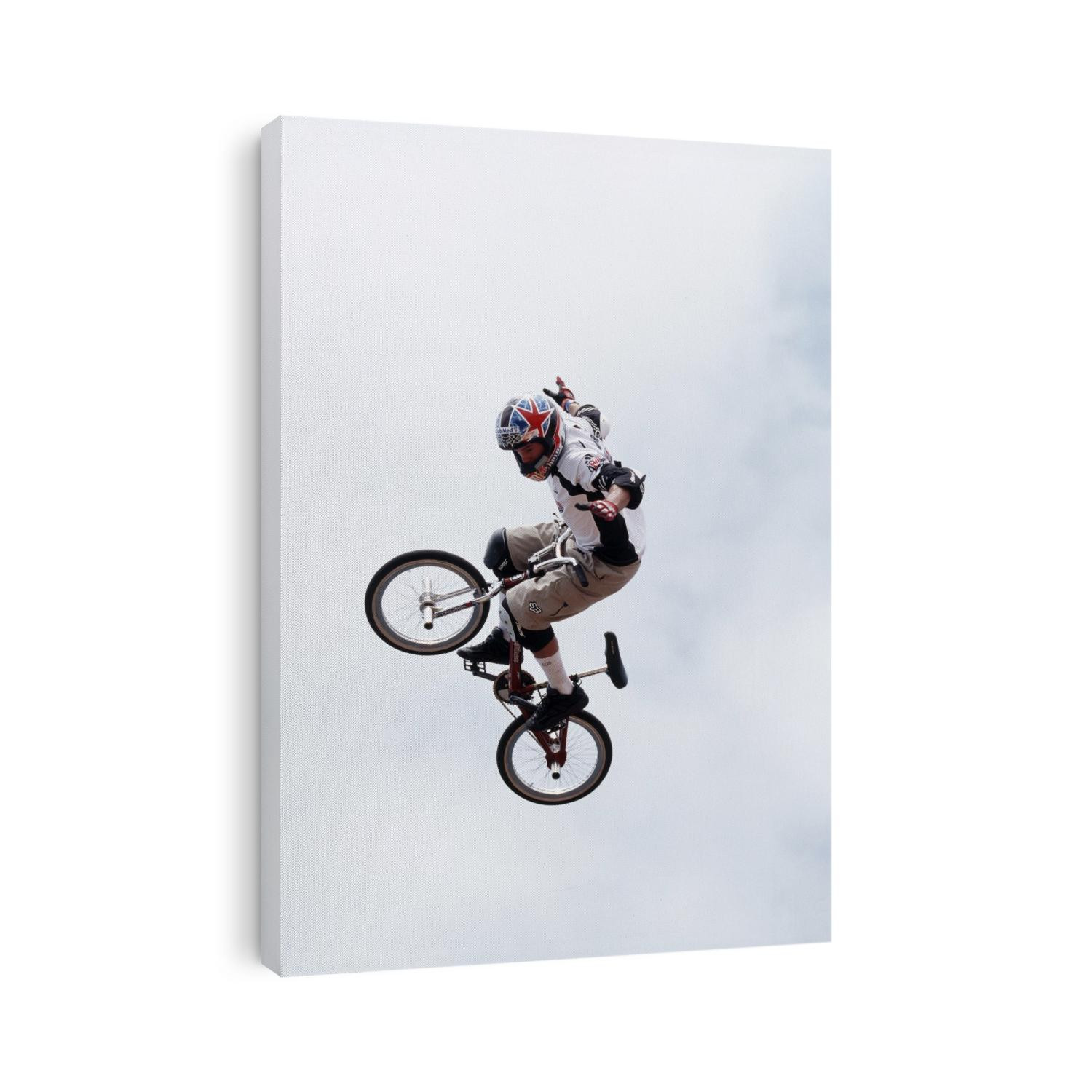 Dave Mirra flying over the vert on his BMX bike at the 1999 B3 X-games competition.