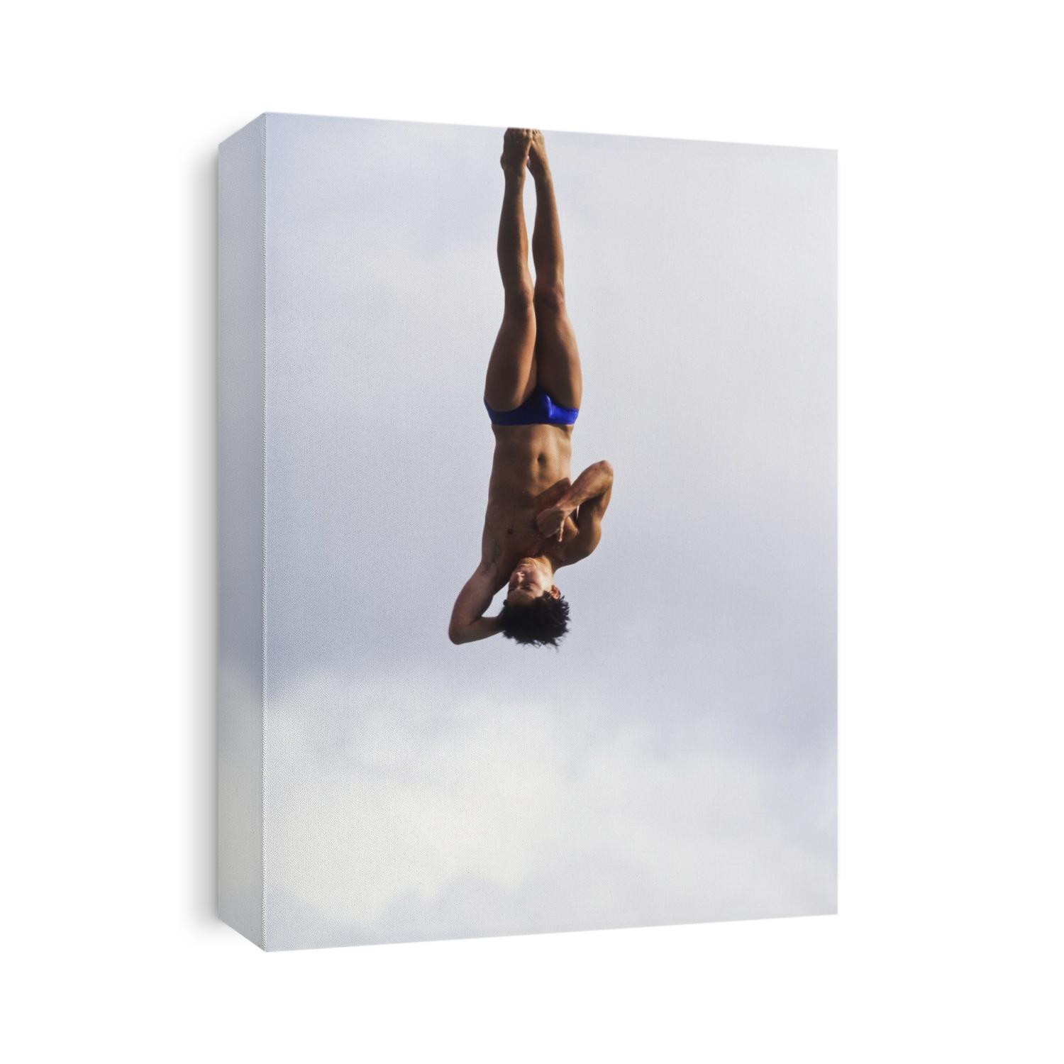 Male diver in the air.