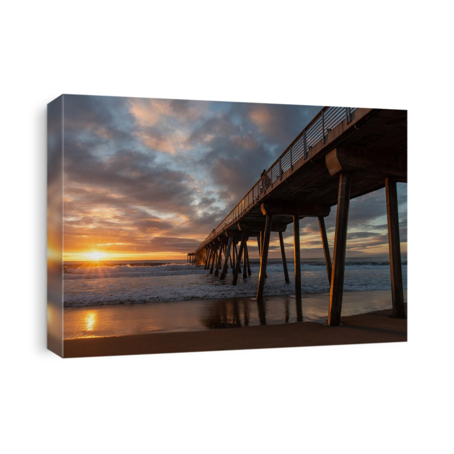 The last moments of daylight as the sun sets near the Hermosa Beach Pier