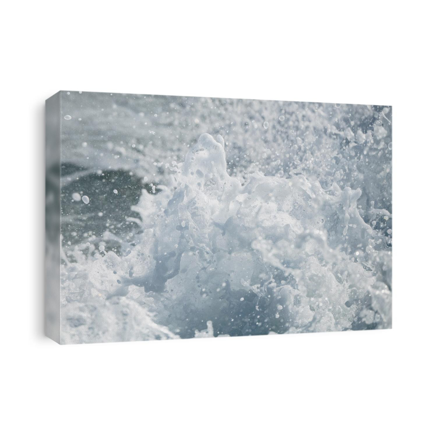 The last transition of a wave before it hits the shore creates unique sea spray patterns