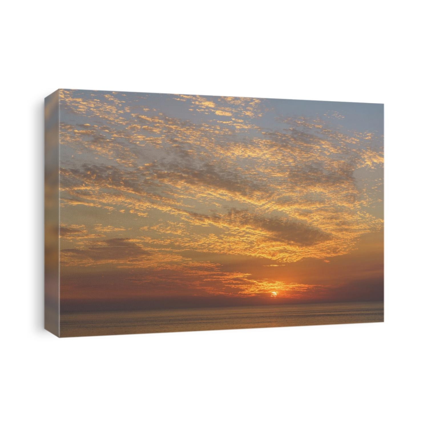 The suns ray illuminate the evening sky off the coast of Southern California