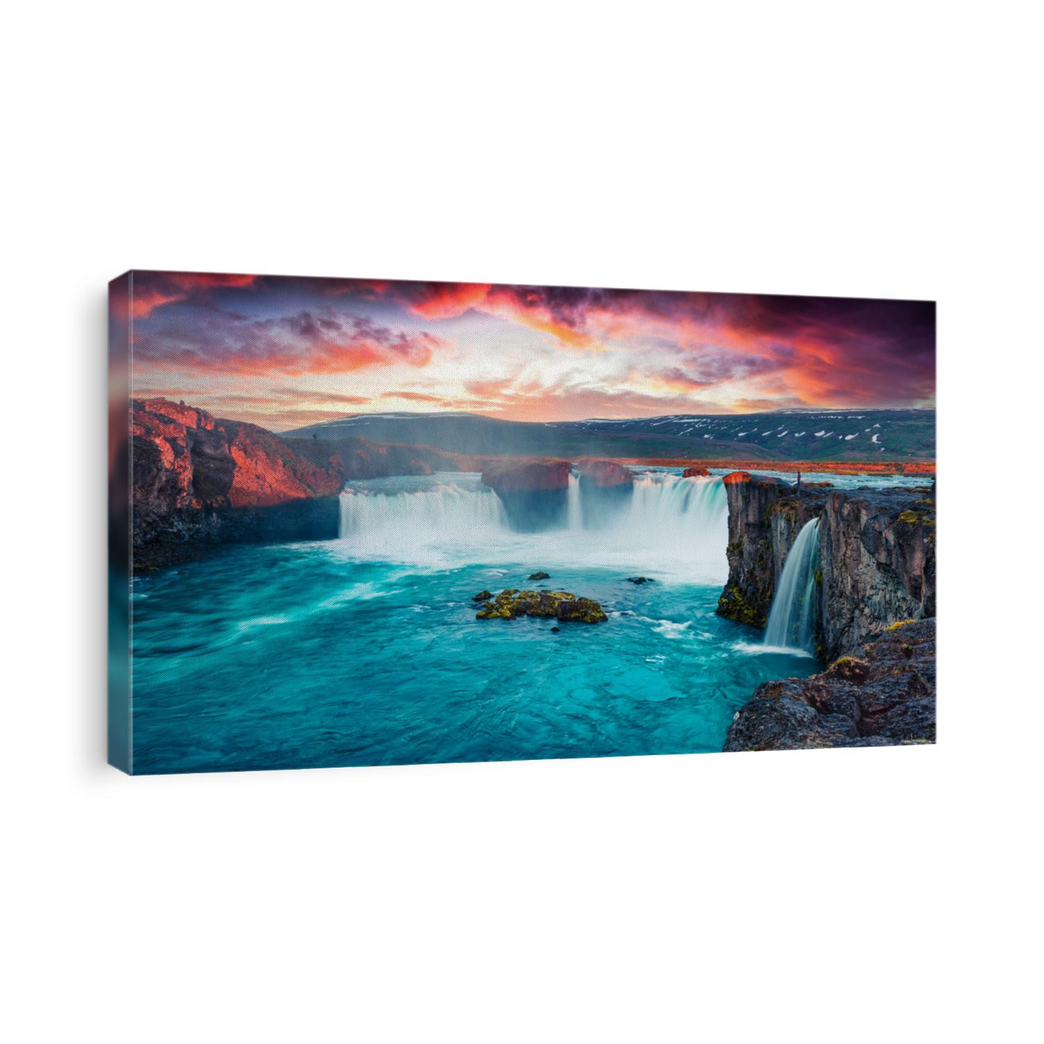 Unbelievable summer morning scene on the Godafoss Waterfall. Colorful sunrise on the on Skjalfandafljot river, Iceland, Europe. Beauty of nature concept background.