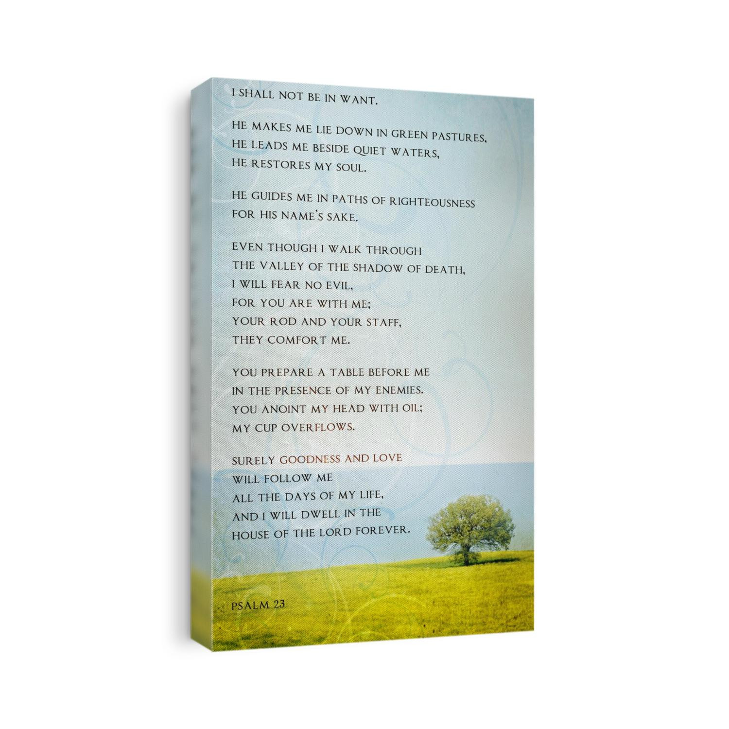 Vintage tree on green grass in front of lake with Psalm 23