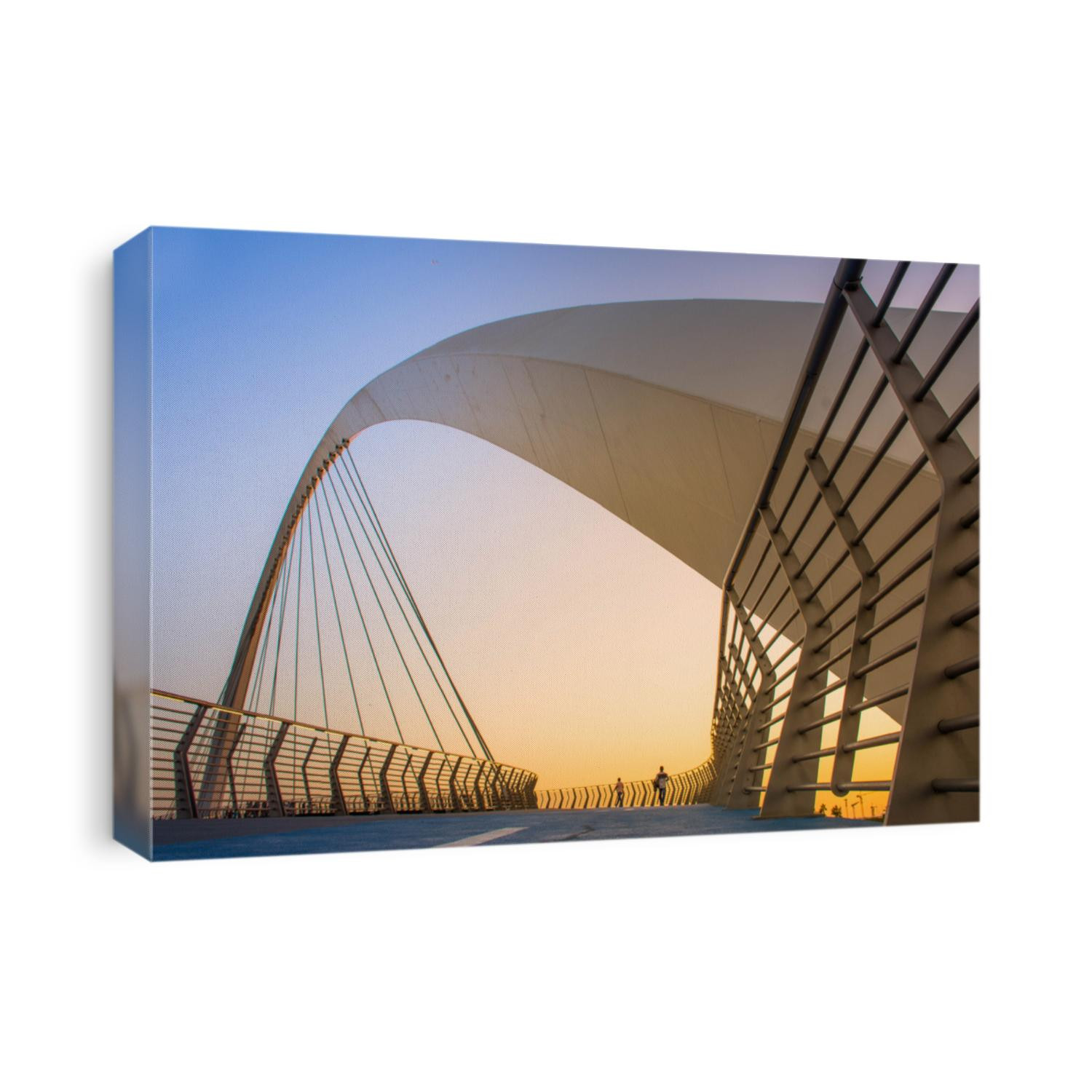 Evening shot of Dubai FamousWater Canal Bridge
New Attraction of Dubai City, place to visit in UAE, tourist place in Dubai, travel destination, modern architecture beautiful sunset at Tolerance Bridge