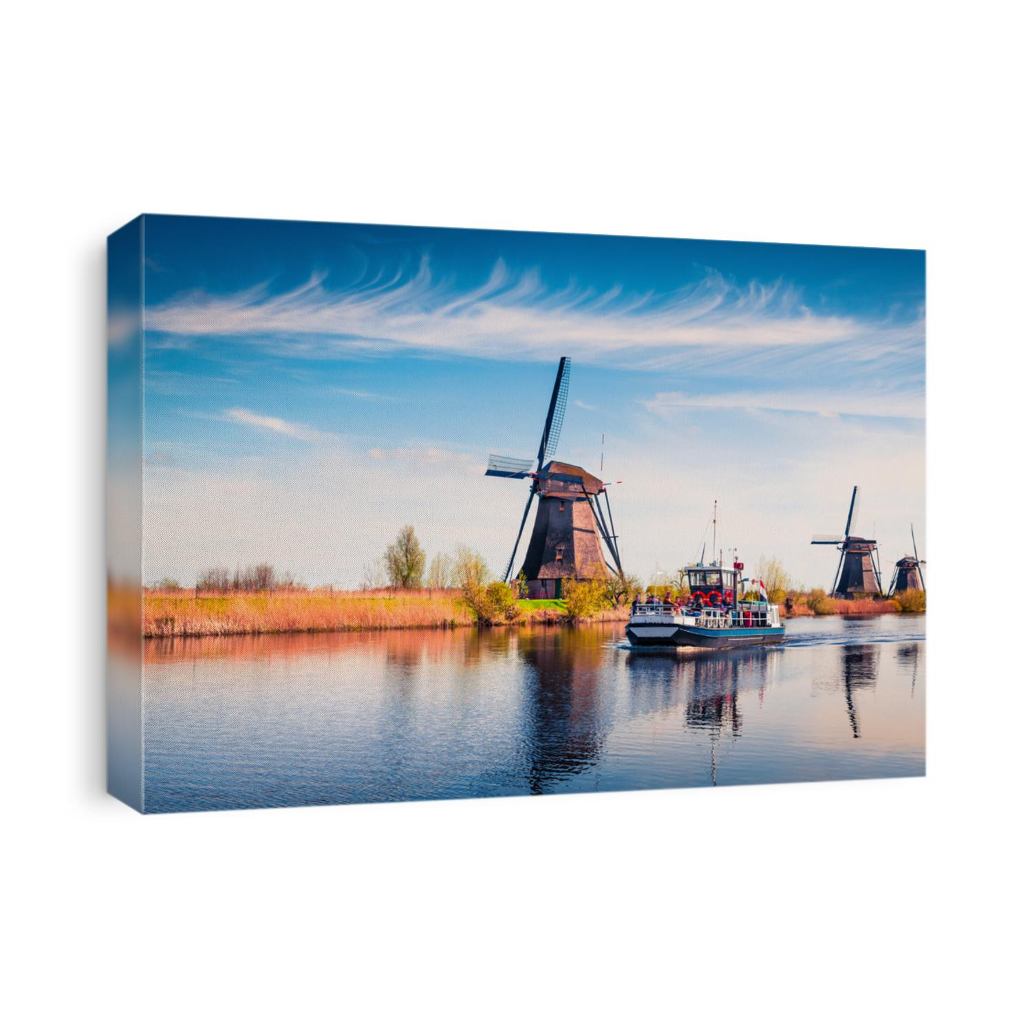 Famous windmills in Kinderdijk museum in Holland. Sunny spring morning in countryside. Colorful outdoor scene in Netherlands, Europe. UNESCO World Heritage Site. Artistic style post processed photo.