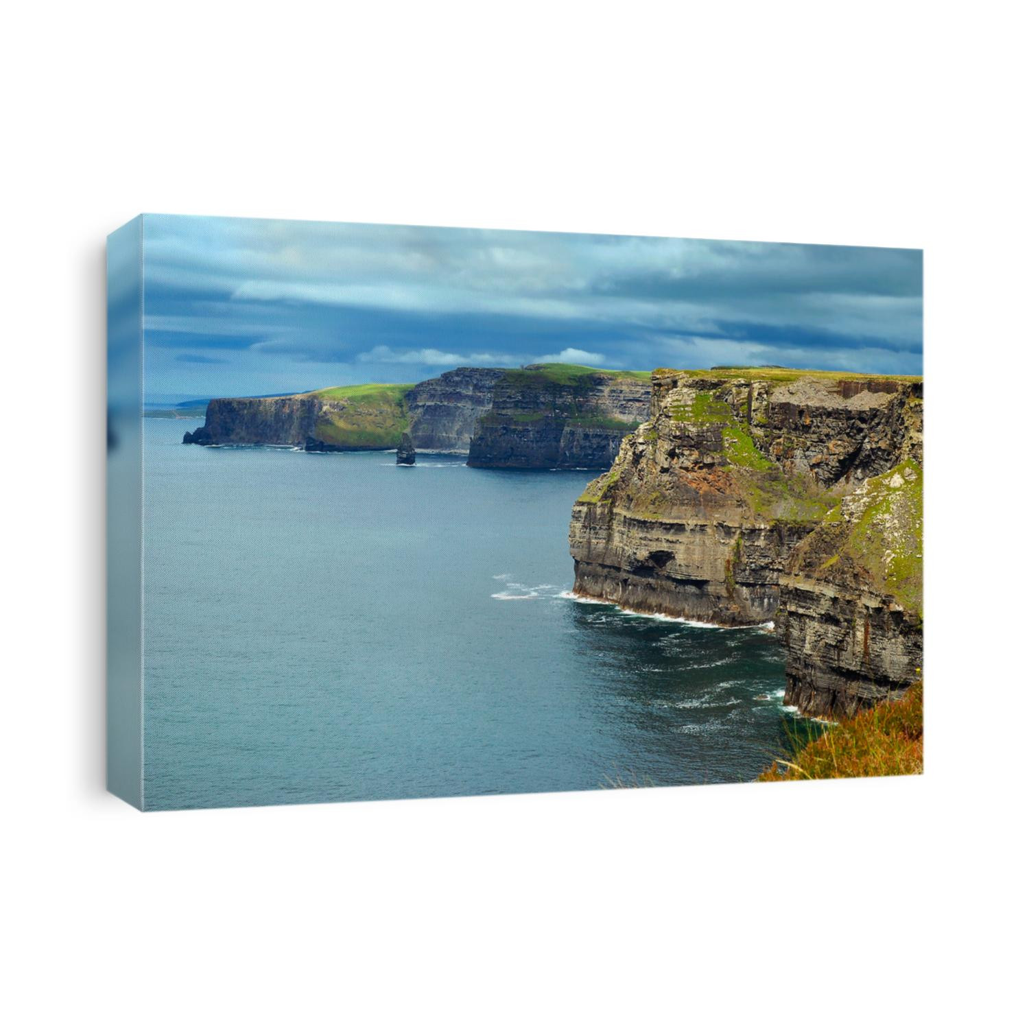 Atlantic ocean with view on Cliffs of Moher in County Clare, Ireland