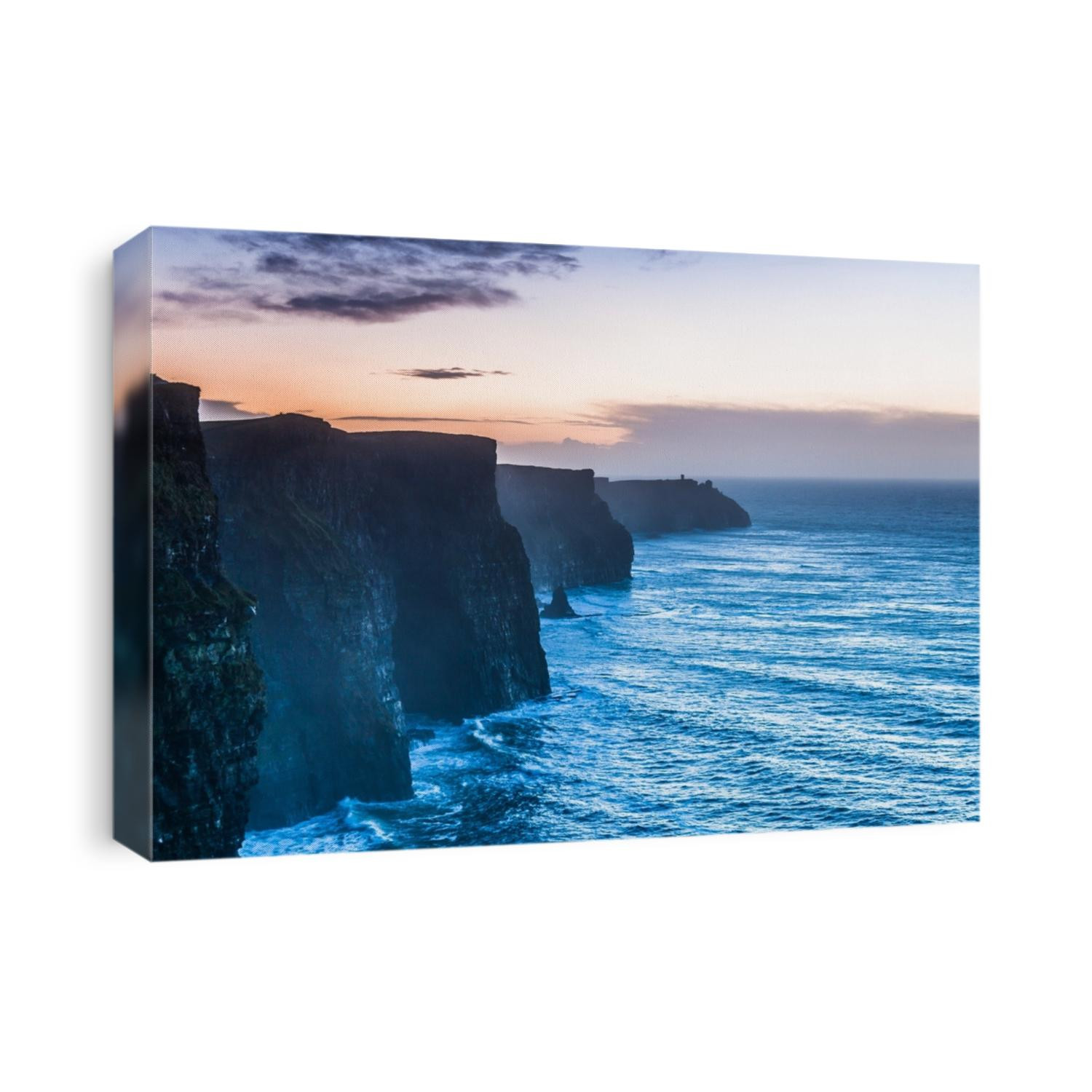 Famous cliffs of Moher at sunset in Co. Clare Ireland Europe. Beautiful landscape natural attraction.