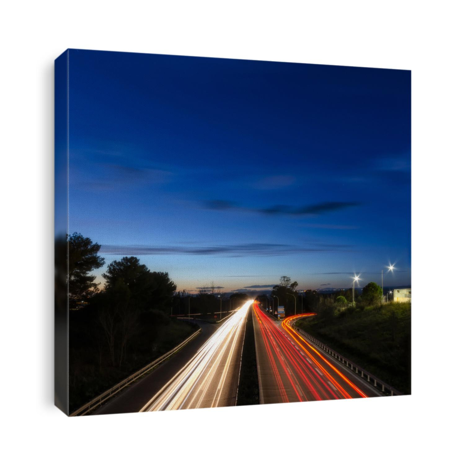 Light painting made by cars over an Italian highway. Shot taken by a long exposure in camera during a beautiful sunset.