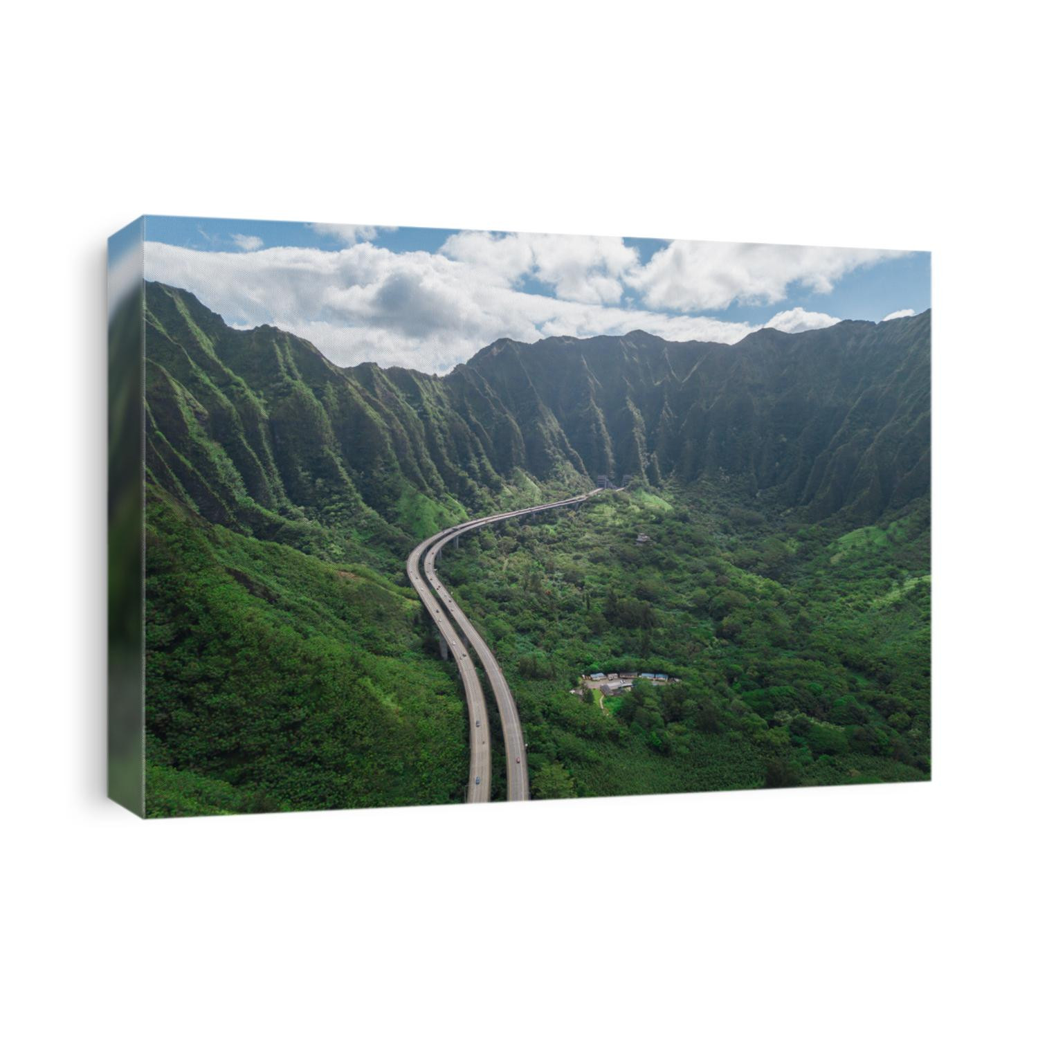 Aerial view of Oahu highway between the mountain of Hawaii. Road to Heaven. 
