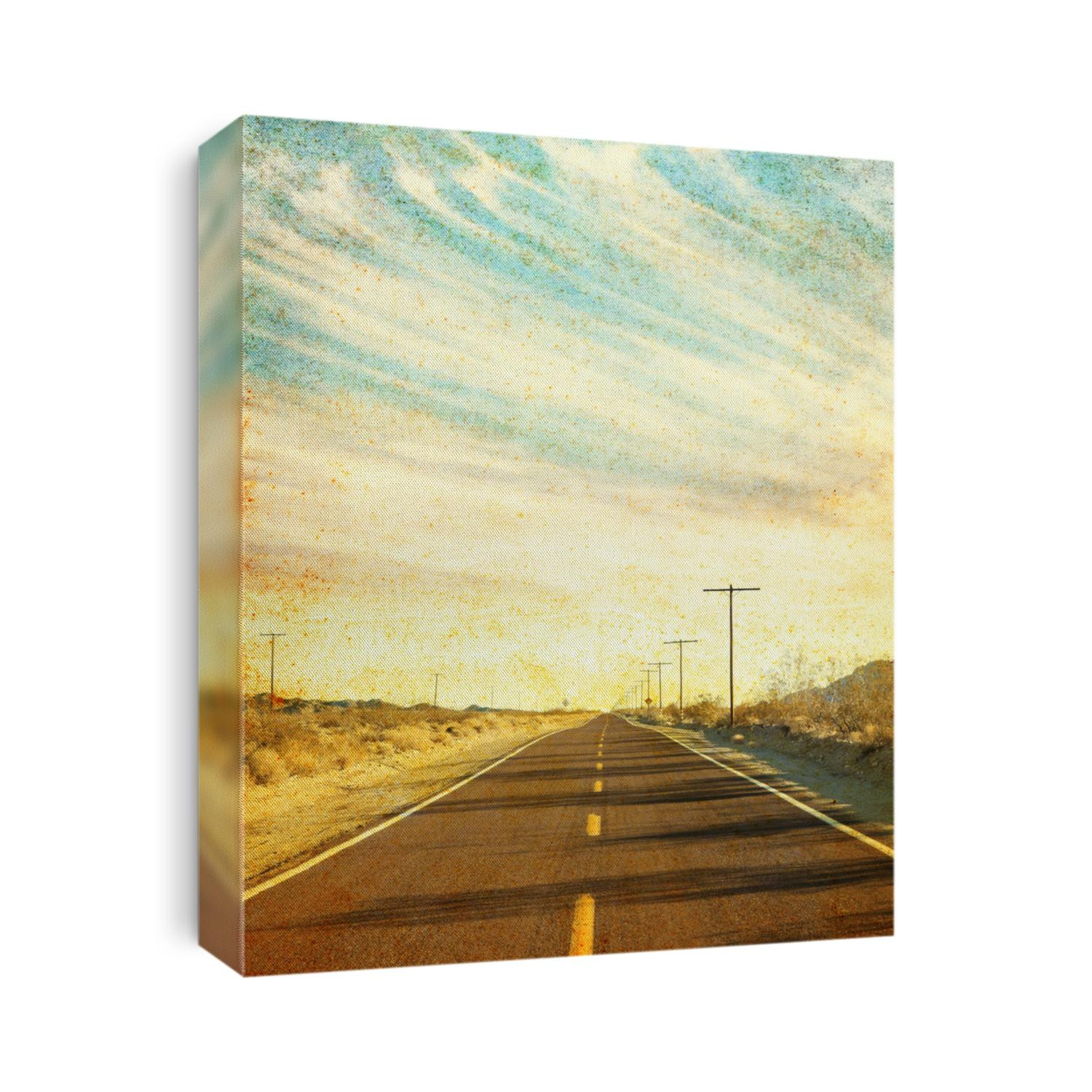 An empty desert road in Arizona's Mojave desert with grunge stains and spots. Image has a distinct paper texture visible at 100%.