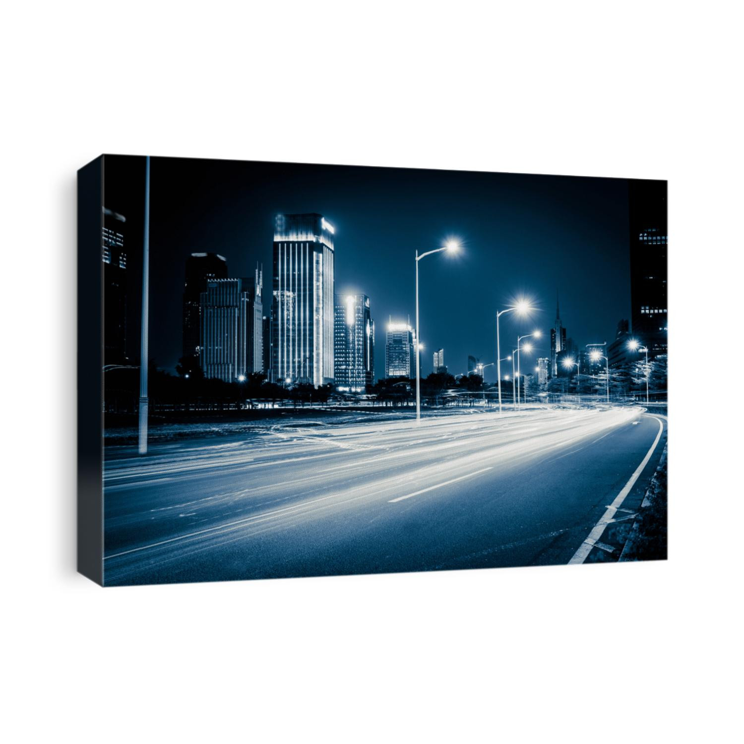 light trails on the modern city street at night