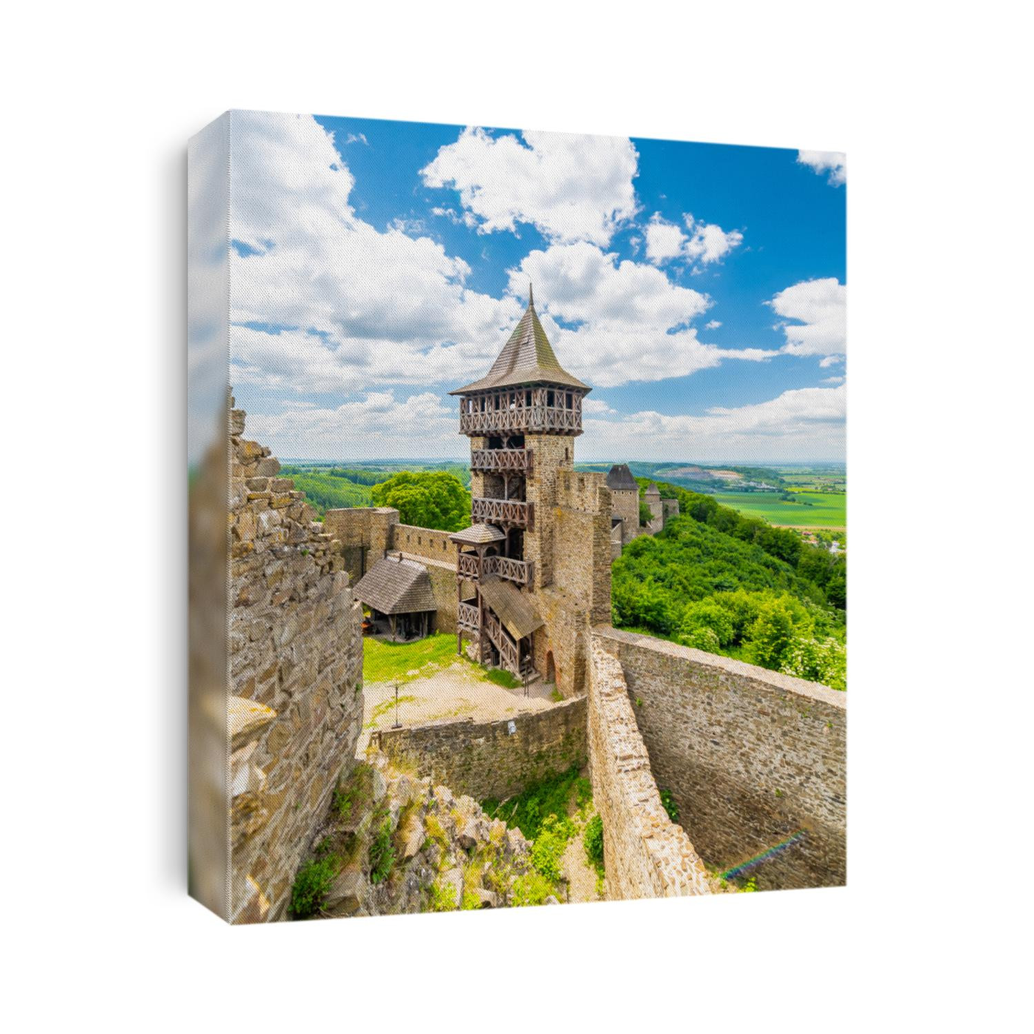 Panorama view of medieval castle Helfstyn, Czech Republic. Detail of tower with stone walls at ancient fortress. Sunny day, blue sky with clouds.