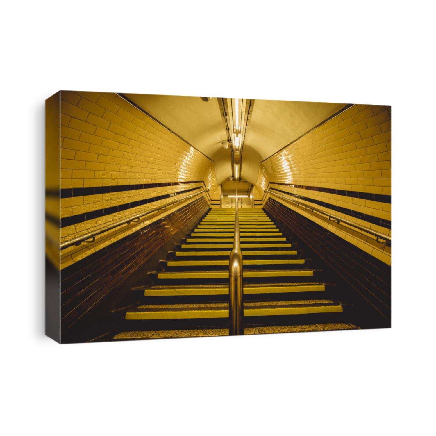Moody yellow tunnel and staircase on London city underground