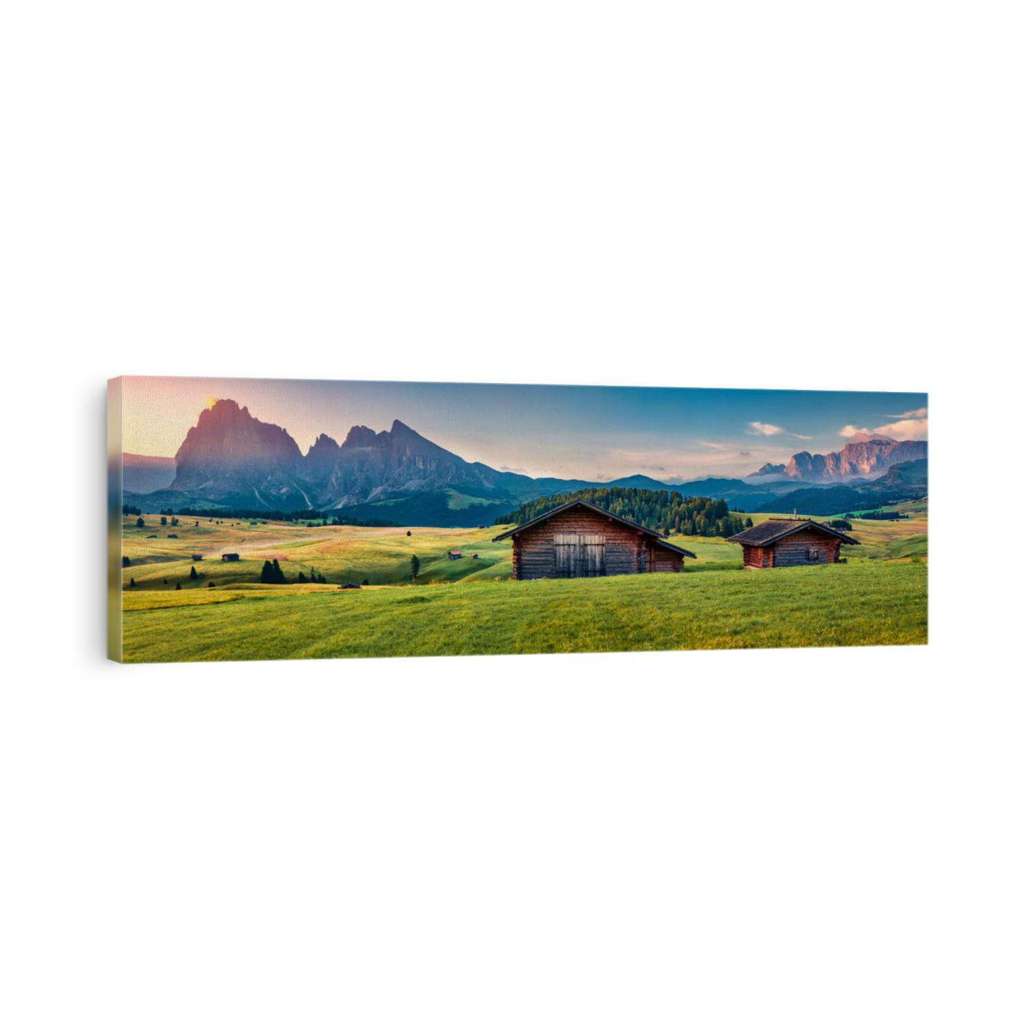 Panoramic morning view of Compaccio village, Seiser Alm or Alpe di Siusi location, Bolzano province, South Tyrol, Italy, Europe. Beautiful summer sunrise of Dolomiti Alps. Traveling concept background
