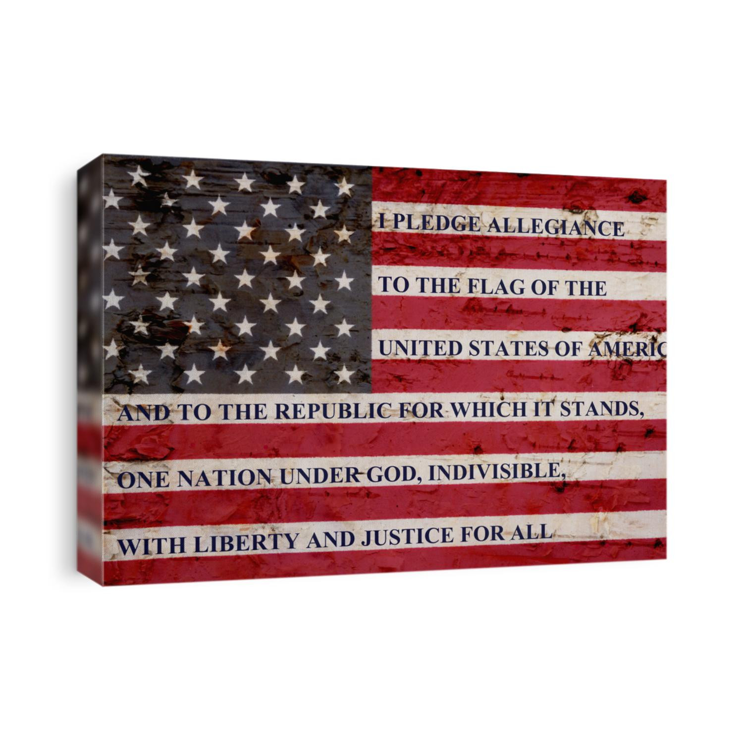 The pledge of allegiance written on a weathered United States of America flag